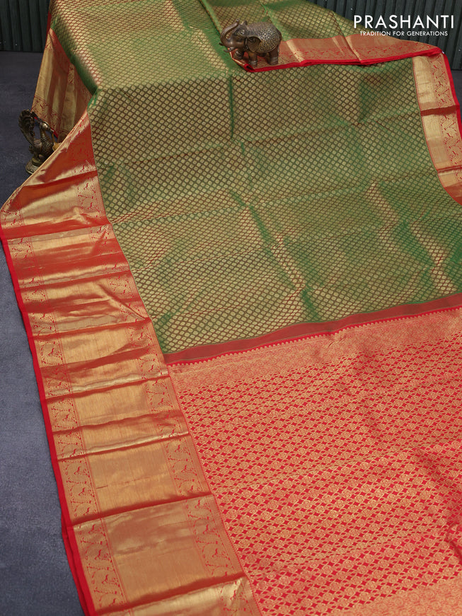 Pure kanchipuram silk saree dual shade of green and red with allover zari woven butta weaves and long zari woven border