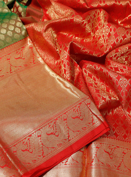 Pure kanchipuram silk saree dual shade of green and red with allover zari woven butta weaves and long zari woven border