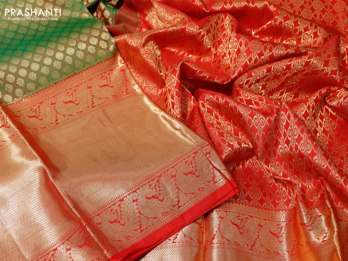 Pure kanchipuram silk saree dual shade of green and red with allover zari woven butta weaves and long zari woven border