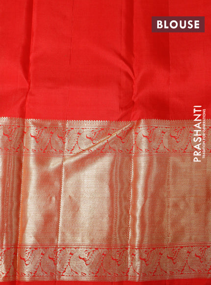 Pure kanchipuram silk saree dual shade of green and red with allover zari woven butta weaves and long zari woven border