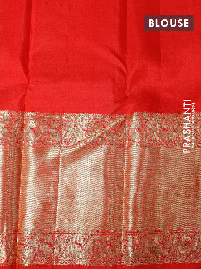 Pure kanchipuram silk saree dual shade of green and red with allover zari woven butta weaves and long zari woven border