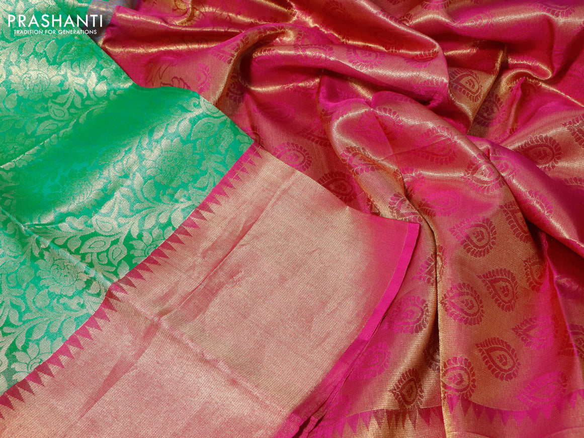 Pure kanchipuram silk saree teal green and pink with allover zari woven floral design brocade weaves and temple design zari border