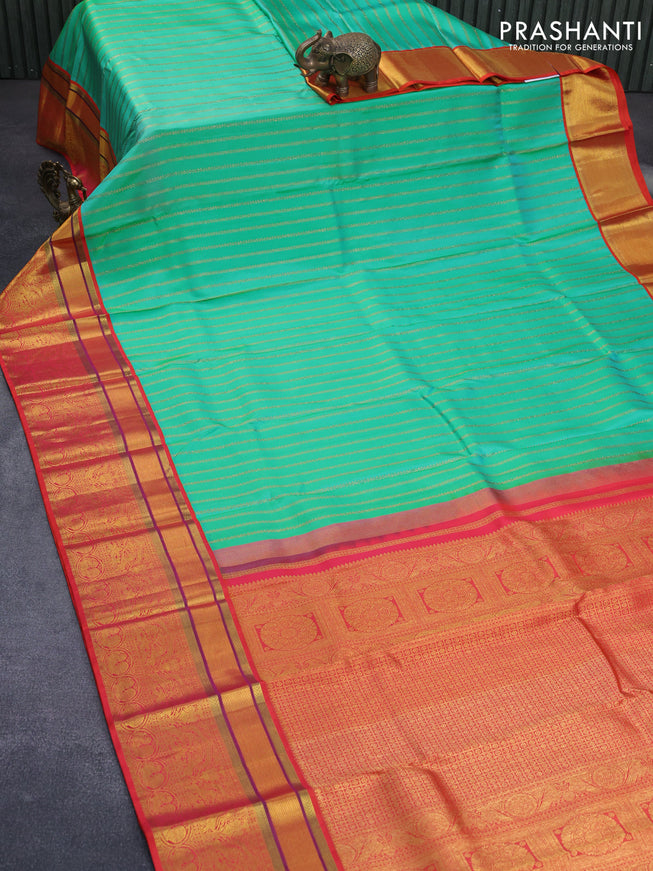 Pure kanchipuram tissue silk saree teal blue and dual shade of orange with allover zari weaves and zari woven border