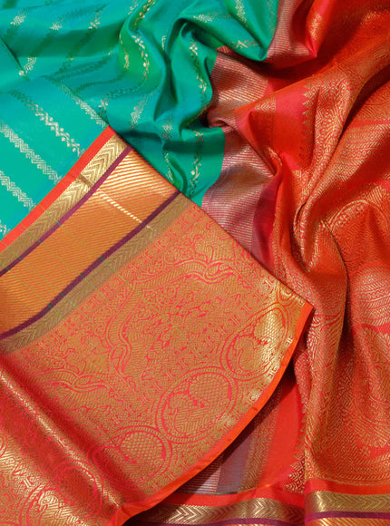 Pure kanchipuram tissue silk saree teal blue and dual shade of orange with allover zari weaves and zari woven border