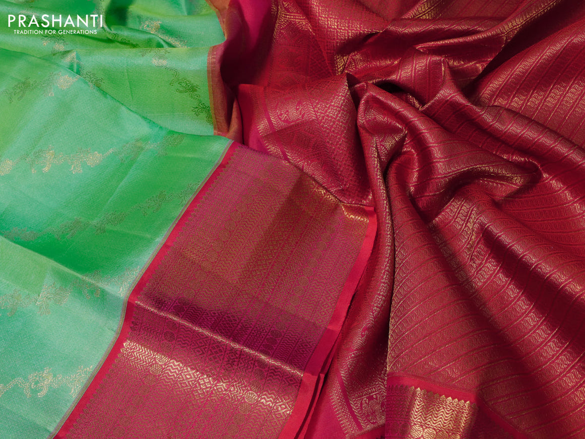 Pure kanchipuram silk saree light green and dual shade of pink with allover zari weaves and zari woven border