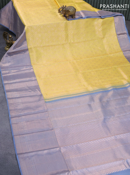 Pure kanchipuram silk saree yellow and grey with allover zari woven brocade weaves and zari woven border