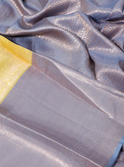 Pure kanchipuram silk saree yellow and grey with allover zari woven brocade weaves and zari woven border