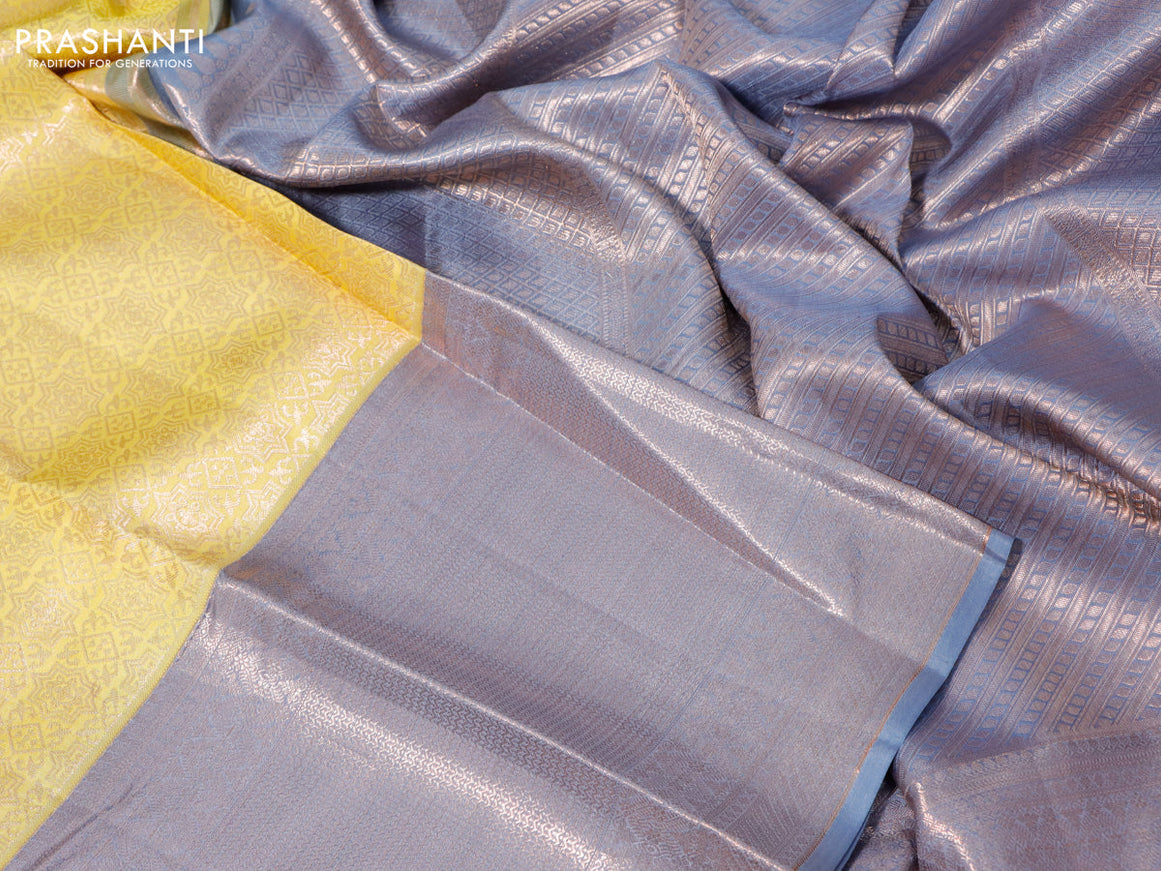 Pure kanchipuram silk saree yellow and grey with allover zari woven brocade weaves and zari woven border