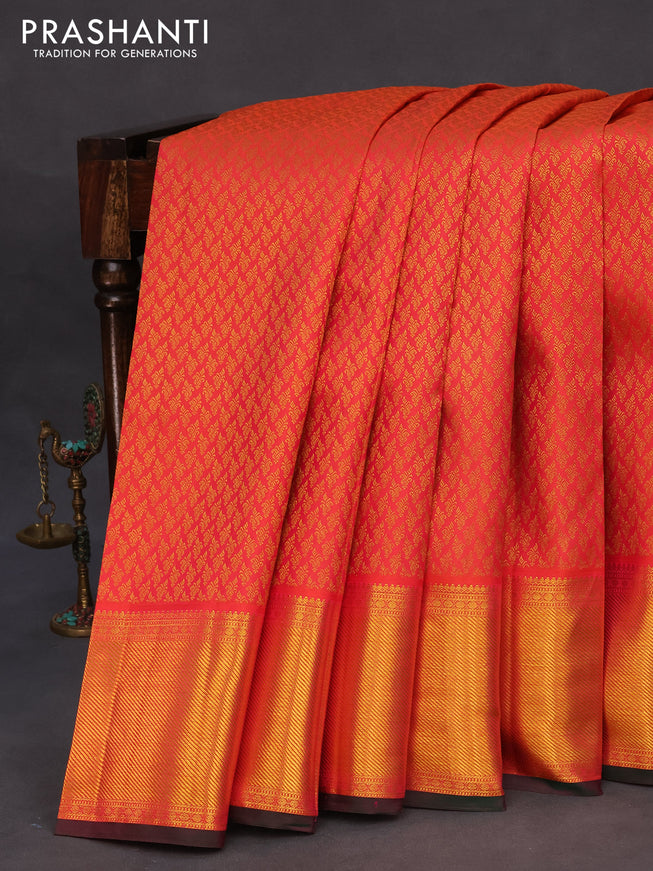 Pure kanchipuram silk saree dual shade of pinkish orange and dual shade of green with allover zari woven brocade weaves and zari woven border