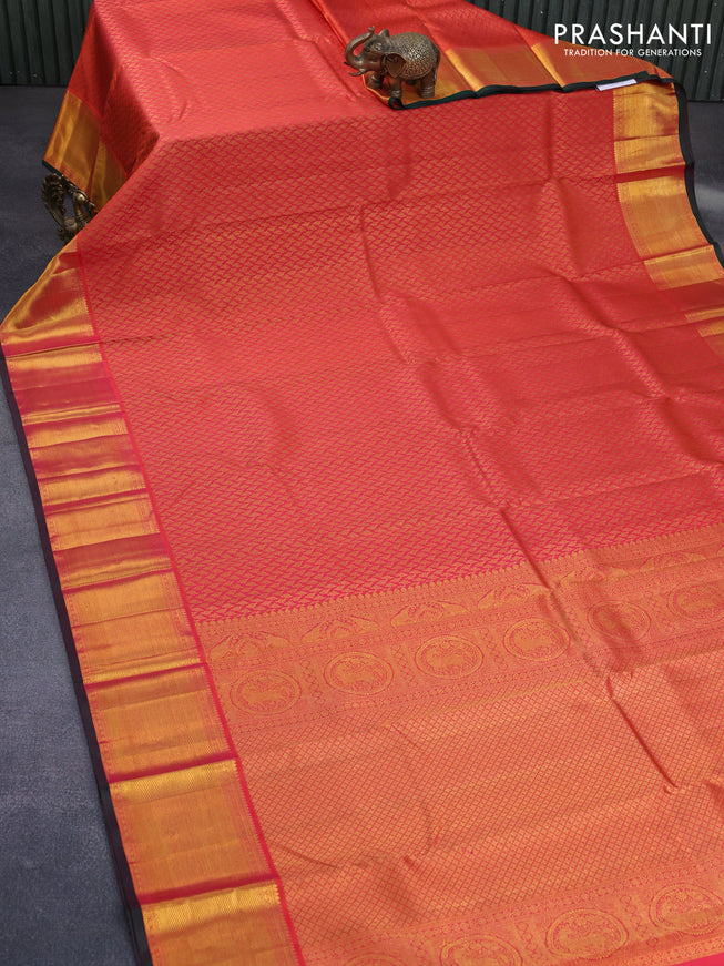 Pure kanchipuram silk saree dual shade of pinkish orange and dual shade of green with allover zari woven brocade weaves and zari woven border