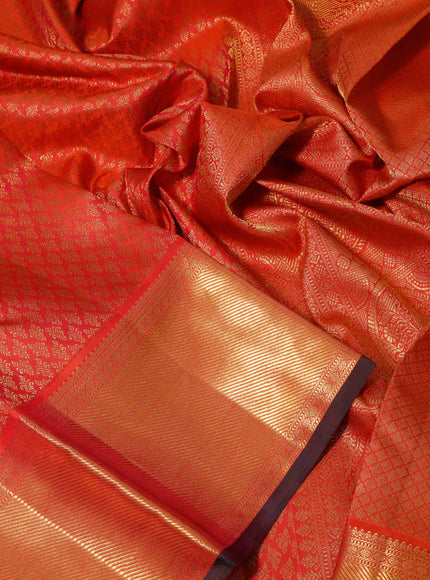 Pure kanchipuram silk saree dual shade of pinkish orange and dual shade of green with allover zari woven brocade weaves and zari woven border