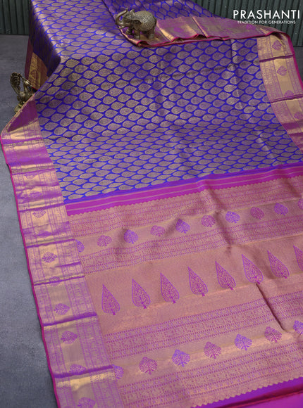 Pure kanchipuram silk saree blue and dual shade of purple with allover zari woven butta weaves and zari woven border