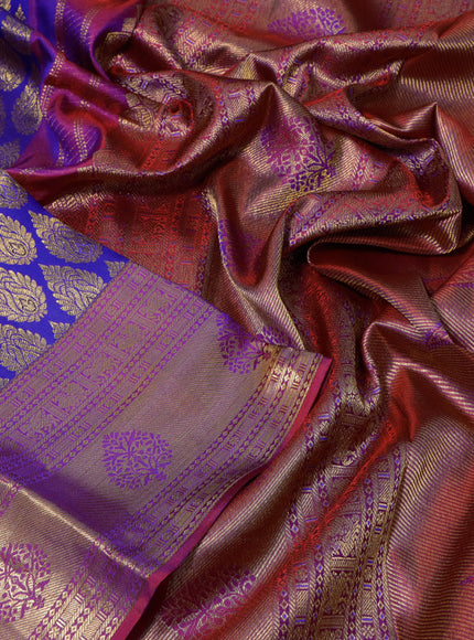 Pure kanchipuram silk saree blue and dual shade of purple with allover zari woven butta weaves and zari woven border