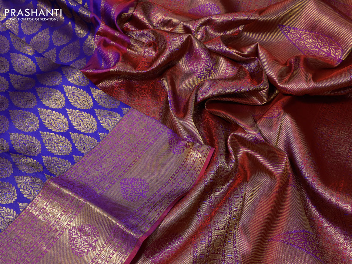 Pure kanchipuram silk saree blue and dual shade of purple with allover zari woven butta weaves and zari woven border