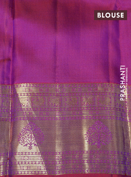 Pure kanchipuram silk saree blue and dual shade of purple with allover zari woven butta weaves and zari woven border