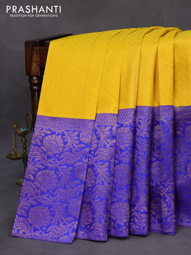 Pure kanchipuram silk saree yellow and royal blue with allover zari woven brocade weaves and long zari woven border