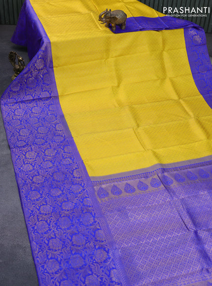 Pure kanchipuram silk saree yellow and royal blue with allover zari woven brocade weaves and long zari woven border