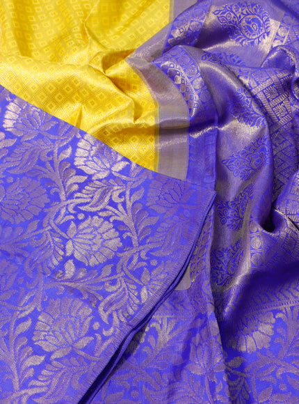 Pure kanchipuram silk saree yellow and royal blue with allover zari woven brocade weaves and long zari woven border