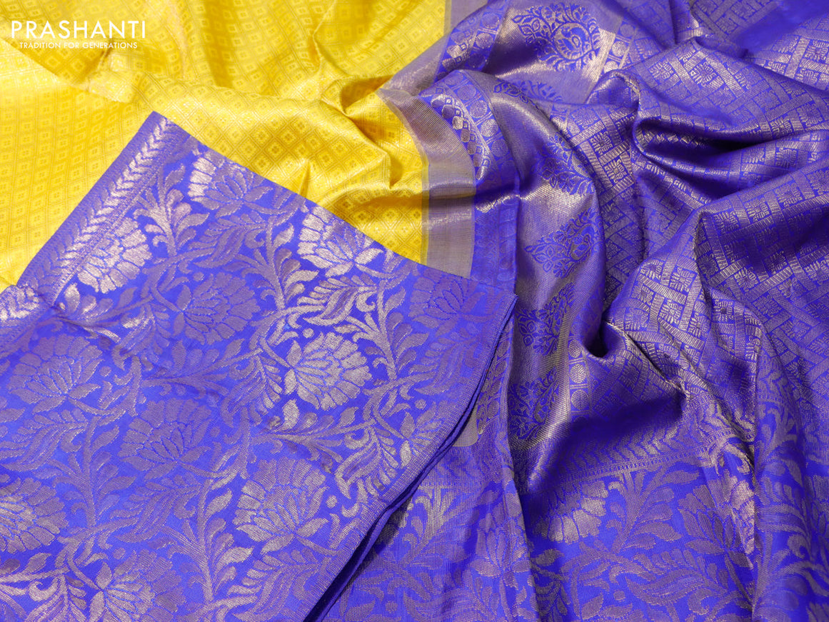 Pure kanchipuram silk saree yellow and royal blue with allover zari woven brocade weaves and long zari woven border