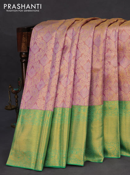 Pure kanchipuram tissue silk saree dual shade of lavender and teal green with allover zari woven brocade weaves and long zari woven border