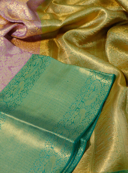 Pure kanchipuram tissue silk saree dual shade of lavender and teal green with allover zari woven brocade weaves and long zari woven border