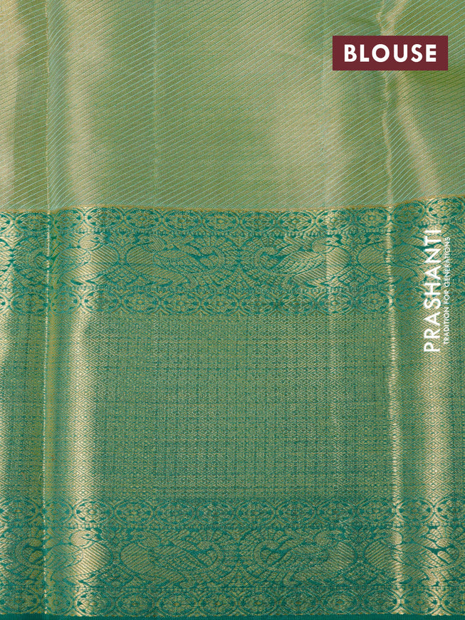 Pure kanchipuram tissue silk saree dual shade of lavender and teal green with allover zari woven brocade weaves and long zari woven border