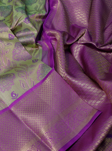 Pure kanchipuram tissue silk saree pastel green and violet with allover zari woven brocade weaves and long zari woven border