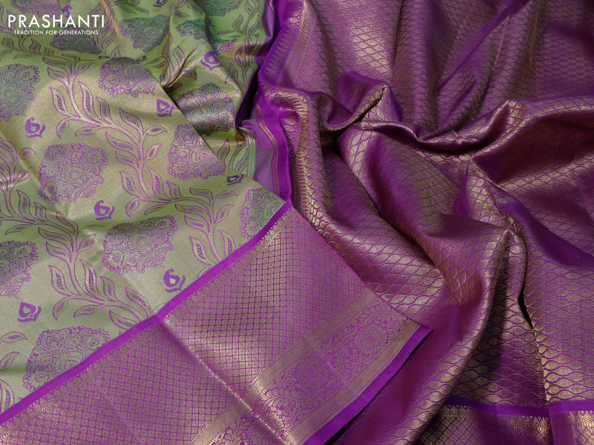 Pure kanchipuram tissue silk saree pastel green and violet with allover zari woven brocade weaves and long zari woven border