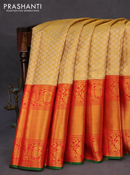 Pure kanchipuram tissue silk saree gold and red with allover zari woven brocade weaves and long annam zari woven border