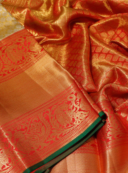 Pure kanchipuram tissue silk saree gold and red with allover zari woven brocade weaves and long annam zari woven border