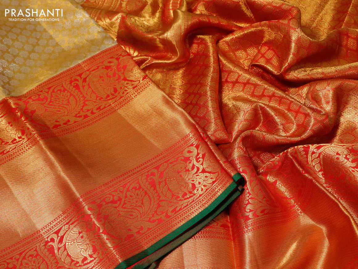 Pure kanchipuram tissue silk saree gold and red with allover zari woven brocade weaves and long annam zari woven border