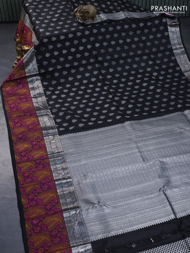 Pure kanchipuram silk saree black with allover silver zari woven buttas and long silver zari woven paisley border