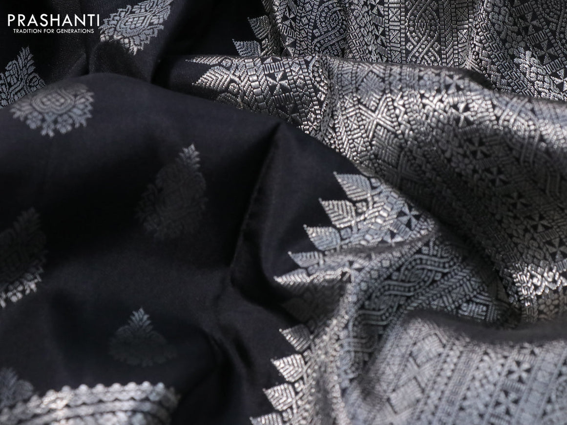 Pure kanchipuram silk saree black with allover silver zari woven buttas and long silver zari woven paisley border