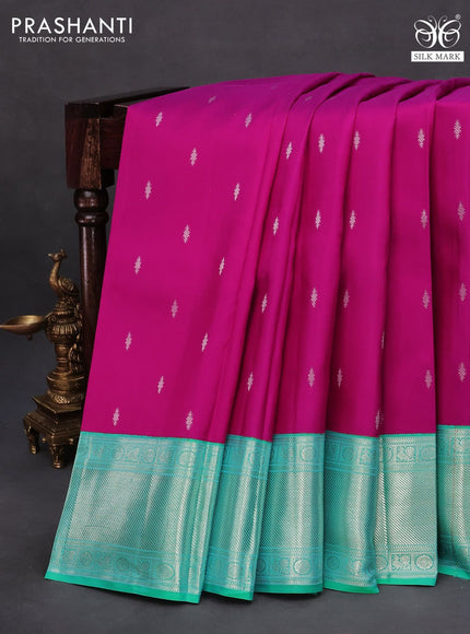 Pure kanchipuram silk saree magenta pink and dual shade of teal green with silver zari woven buttas and silver zari woven border