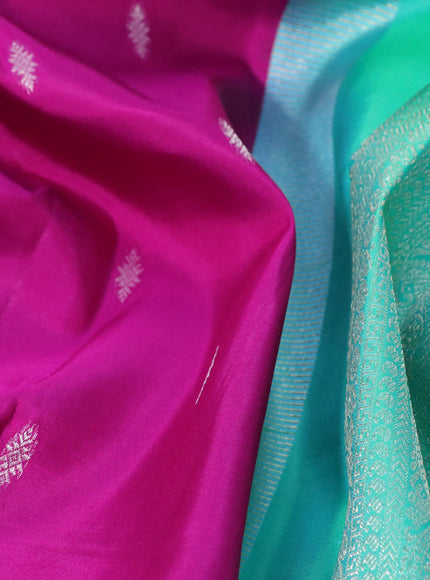 Pure kanchipuram silk saree magenta pink and dual shade of teal green with silver zari woven buttas and silver zari woven border