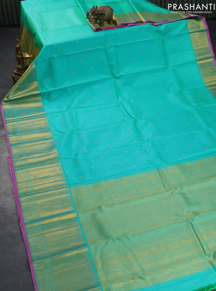 Pure kanchipuram silk saree dual shade of teal green and pink with zari woven buttas and long zari woven border