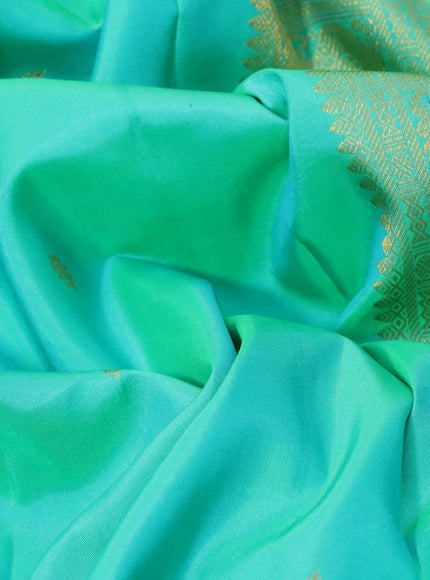 Pure kanchipuram silk saree dual shade of teal green and pink with zari woven buttas and long zari woven border