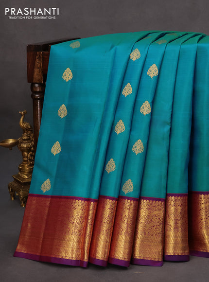 Pure kanchipuram silk saree dual shade of blue and purple with zari woven buttas and rich zari woven korvai border