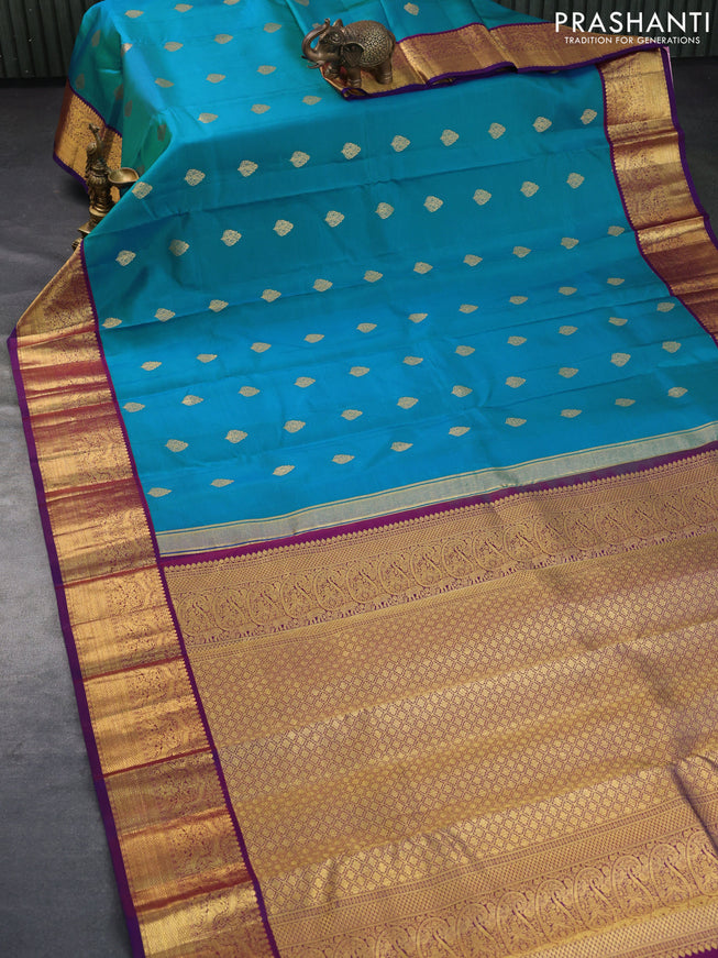 Pure kanchipuram silk saree dual shade of blue and purple with zari woven buttas and rich zari woven korvai border