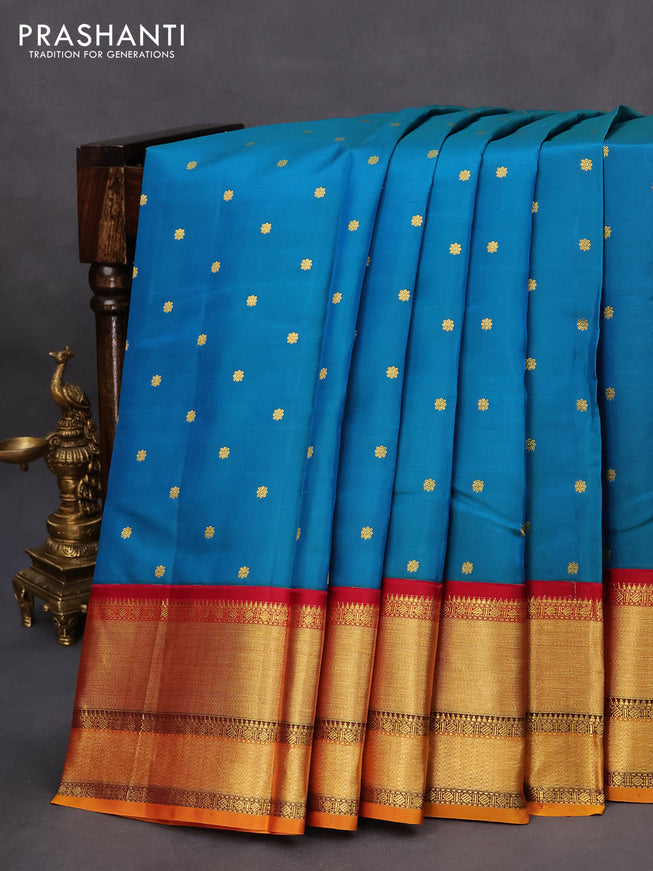 Pure kanchipuram silk saree teal blue shade and dark pink with zari woven buttas and rich zari woven korvai border