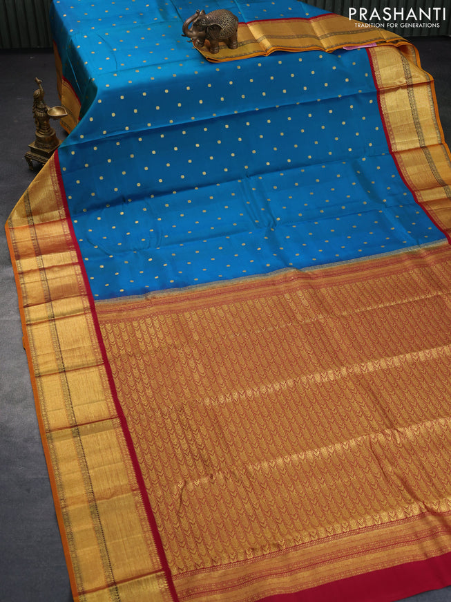 Pure kanchipuram silk saree teal blue shade and dark pink with zari woven buttas and rich zari woven korvai border