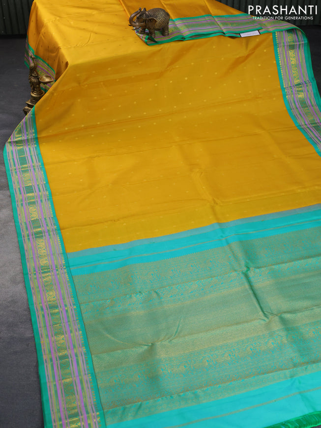 Pure kanchipuram silk saree yellow and teal green with zari woven buttas and rich zari woven border