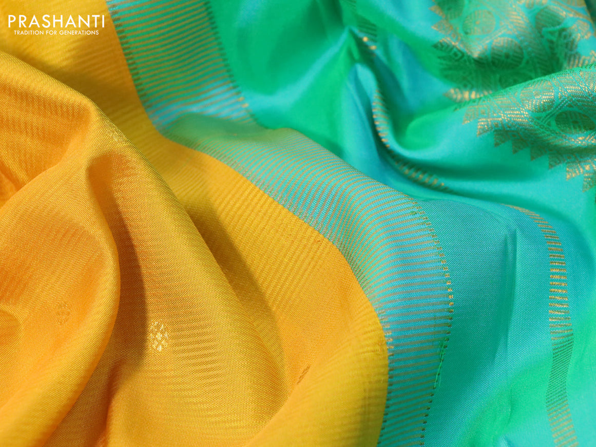 Pure kanchipuram silk saree yellow and teal green with zari woven buttas and rich zari woven border