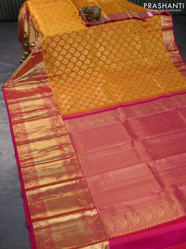 Pure kanchipuram silk saree dark mustard and pink with allover zari woven butta weaves and long rich zari woven border