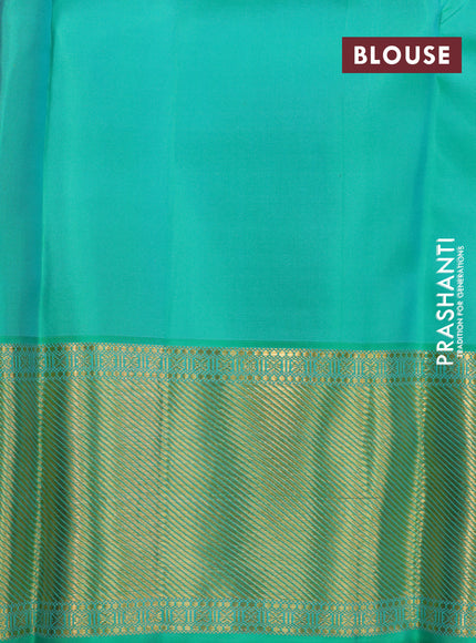 Pure kanchipuram silk saree dual shade of pinkish orange and dual shade of teal bluish green with zari woven buttas and long rich zari woven border