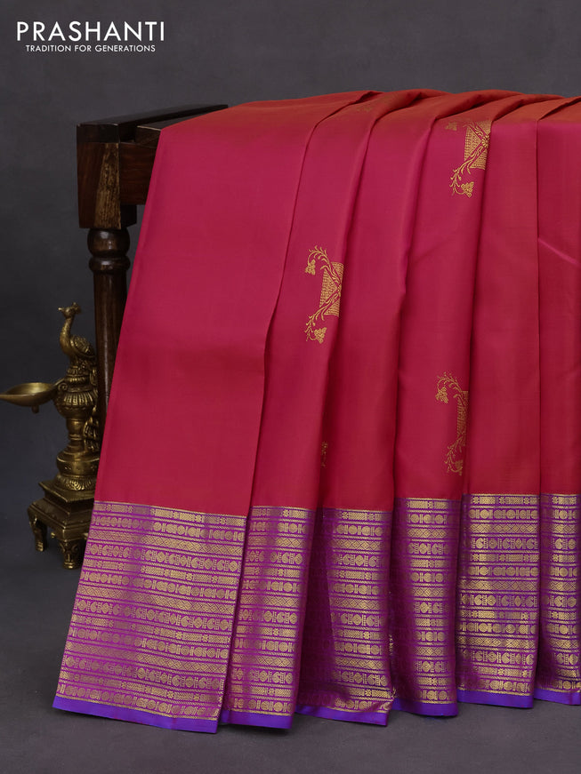 Pure kanchipuram silk saree dual shade of pinkish orange and dual shade of blue with zari woven buttas and rich zari woven border