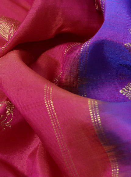 Pure kanchipuram silk saree dual shade of pinkish orange and dual shade of blue with zari woven buttas and rich zari woven border