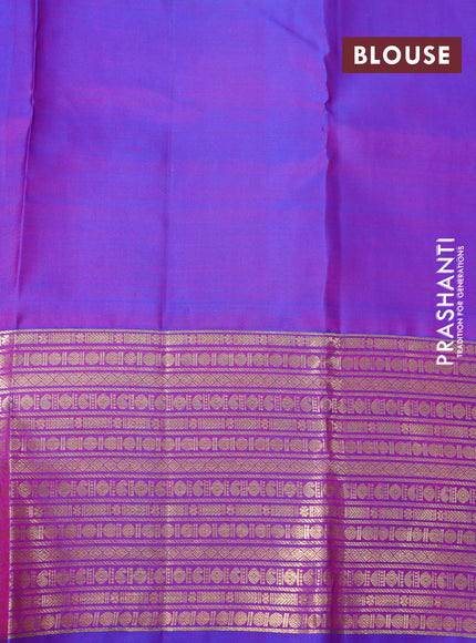 Pure kanchipuram silk saree dual shade of pinkish orange and dual shade of blue with zari woven buttas and rich zari woven border