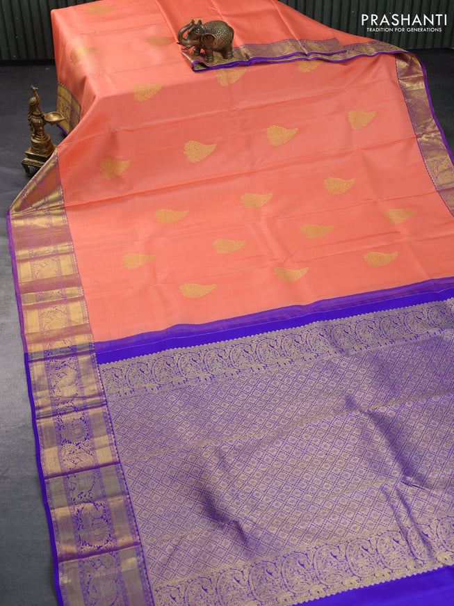 Pure kanchipuram silk saree peach orange and blue with zari woven buttas and rich zari woven annam border