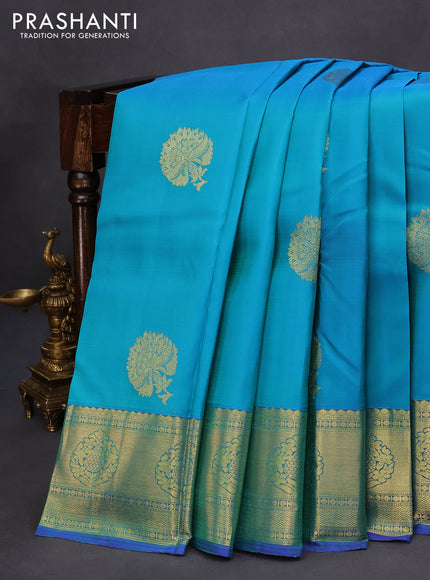 Pure kanchipuram silk saree dual shade of teal blue and dual shade of blue with zari woven buttas and zari woven border